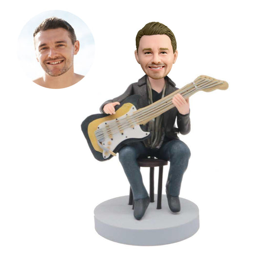 custom guitarist bobbleheads playing guitar sitting on stool