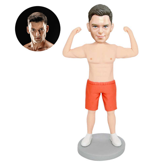 custom male fitness coach bobbleheads in orange shorts